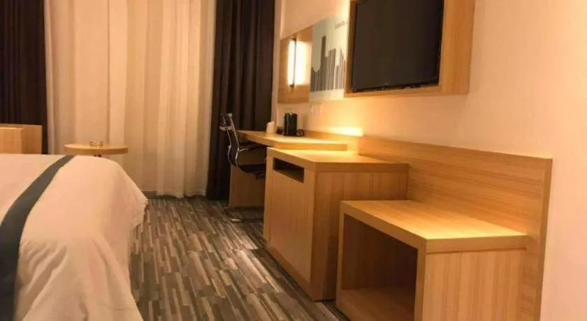 Bed in City Comfort Inn Deyang Shifang Yonghu Park