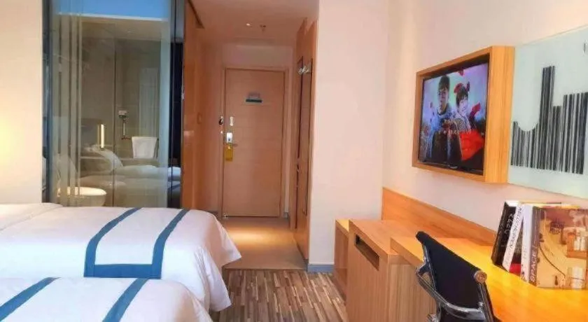 Bed in City Comfort Inn Deyang Shifang Yonghu Park