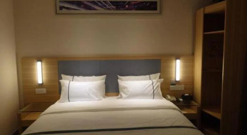 Bed in City Comfort Inn Deyang Shifang Yonghu Park