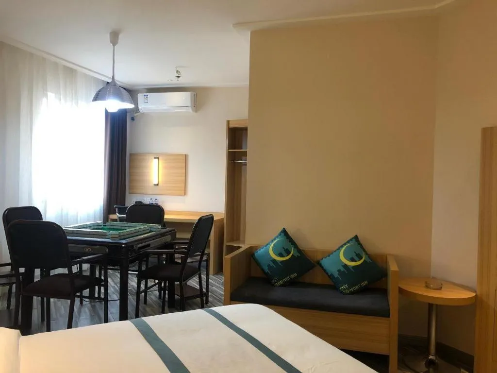 Bed in City Comfort Inn Deyang Shifang Yonghu Park