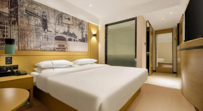 Bed in City Comfort Inn Liuzhou Sanjiang Gulou Bird's Nest