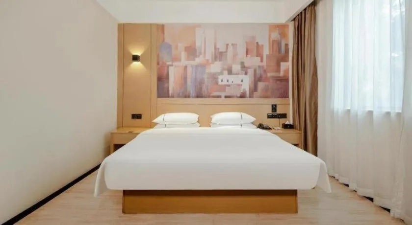 Bed in City Comfort Inn Liuzhou Sanjiang Gulou Bird's Nest