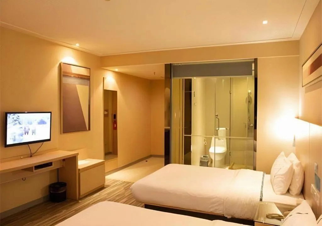 Bed in City Comfort Inn Xiantao Avenue Wangzhou Bridge Wushang