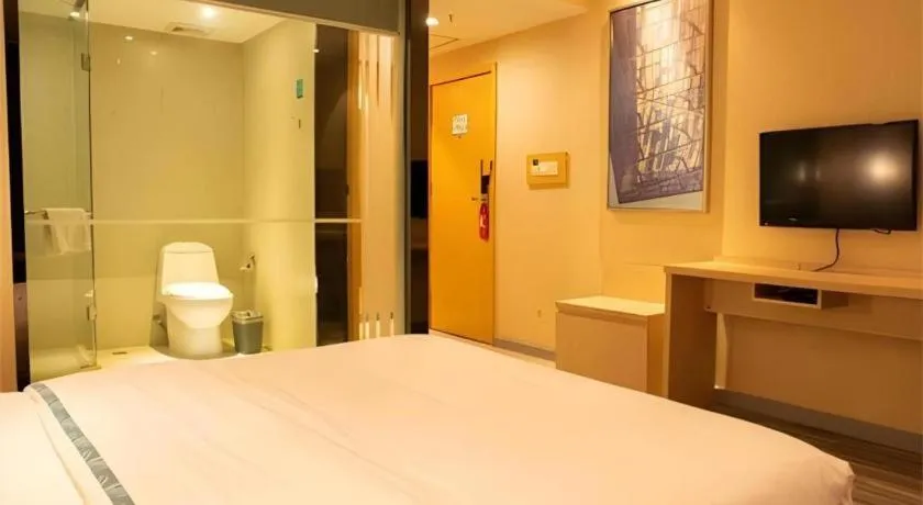 Bed in City Comfort Inn Xiantao Avenue Wangzhou Bridge Wushang