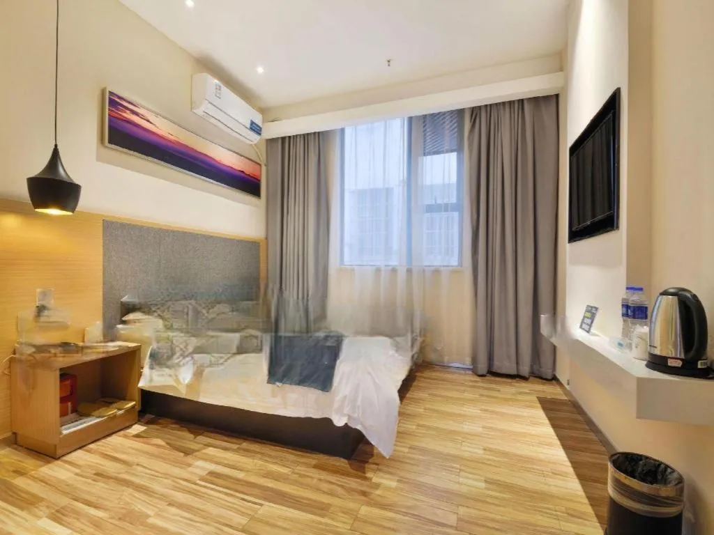 Bed in City Comfort Inn Wuhan Xinzhou Mo'er Cheng