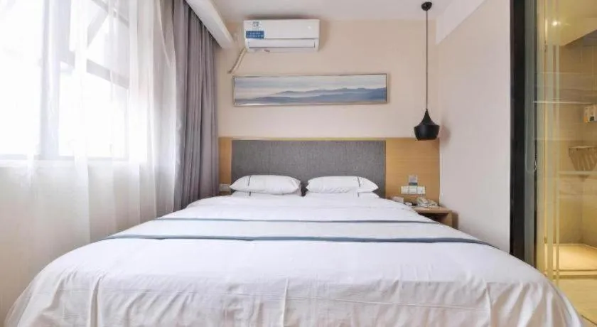 Bed in City Comfort Inn Wuhan Xinzhou Mo'er Cheng