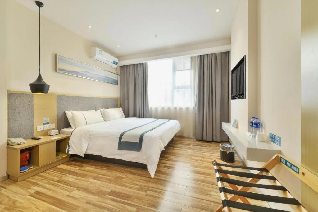 Bed in City Comfort Inn Wuhan Xinzhou Mo'er Cheng