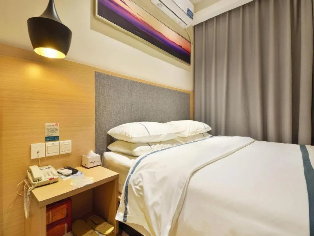 Bed in City Comfort Inn Wuhan Xinzhou Mo'er Cheng