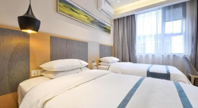 Bed in City Comfort Inn Wuhan Xinzhou Mo'er Cheng