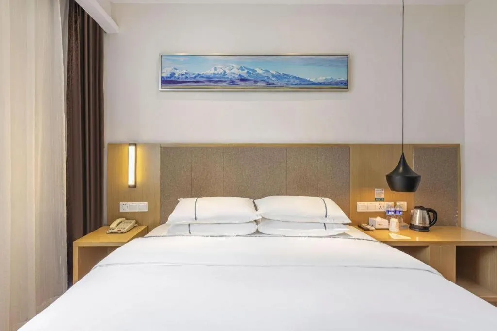 Bed in City Comfort Inn Wuhan Xinzhou Mo'er Cheng