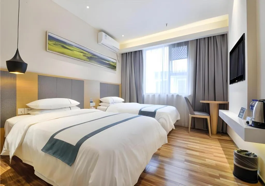 Bed in City Comfort Inn Wuhan Xinzhou Mo'er Cheng