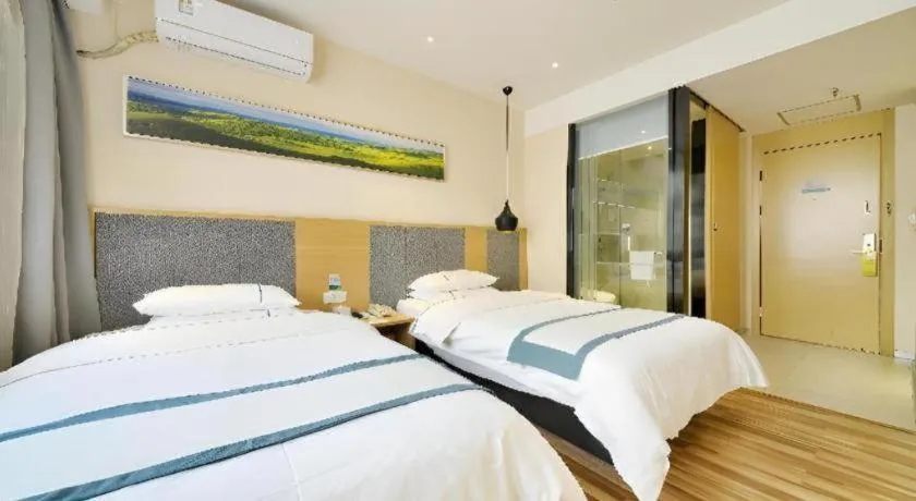 Bed in City Comfort Inn Wuhan Xinzhou Mo'er Cheng