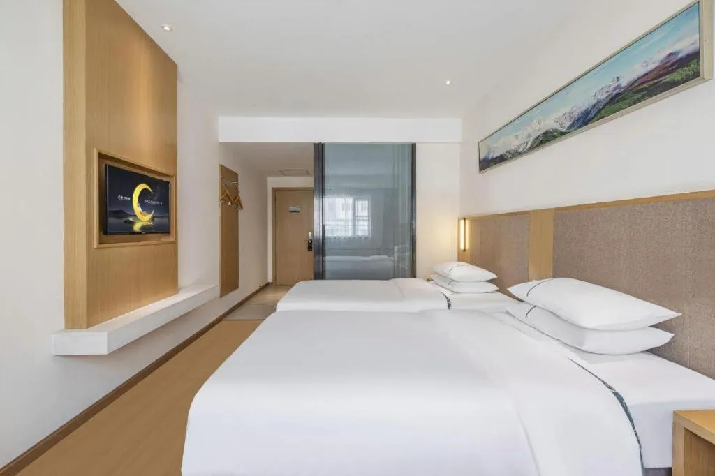 Bed in City Comfort Inn Wuhan Xinzhou Mo'er Cheng