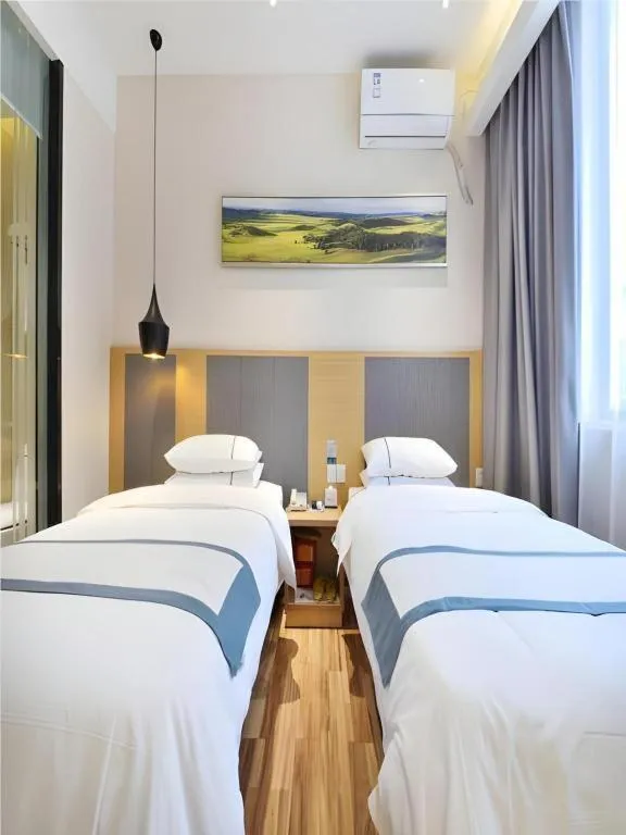 Bed in City Comfort Inn Wuhan Xinzhou Mo'er Cheng