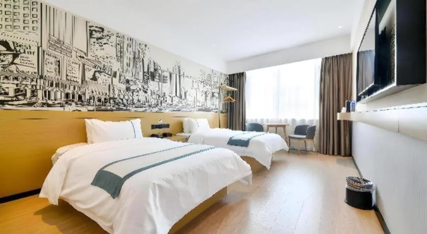 Bed in City Comfort Inn Wuhan Xinzhou Mo'er Cheng