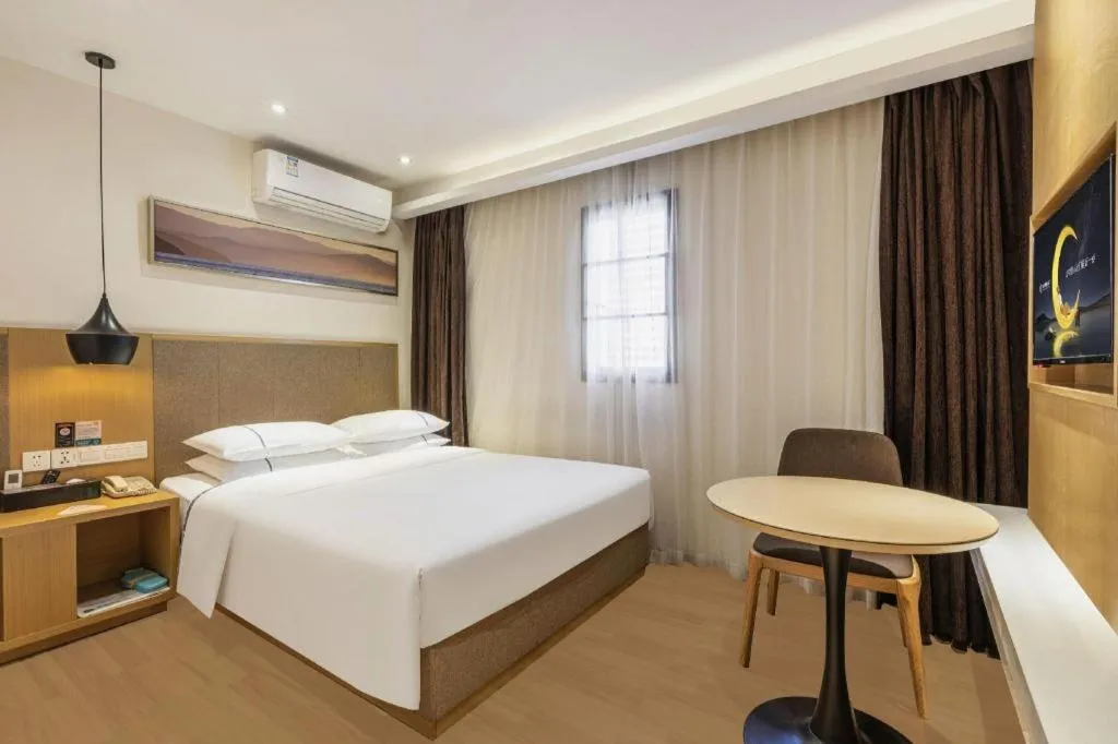 Bed in City Comfort Inn Wuhan Xinzhou Mo'er Cheng