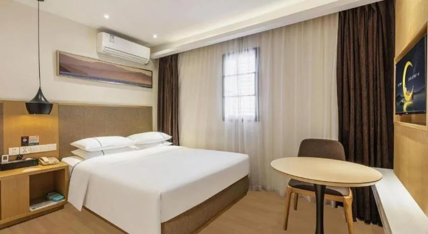 Bed in City Comfort Inn Wuhan Xinzhou Mo'er Cheng