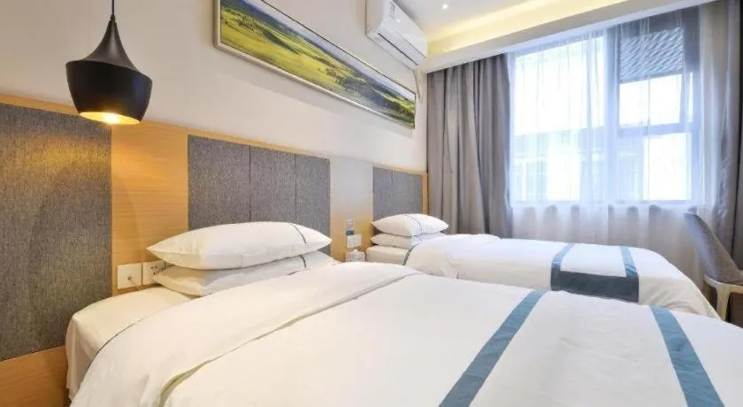 Bed in City Comfort Inn Wuhan Xinzhou Mo'er Cheng