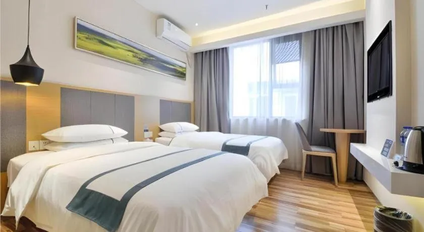 Bed in City Comfort Inn Wuhan Xinzhou Mo'er Cheng