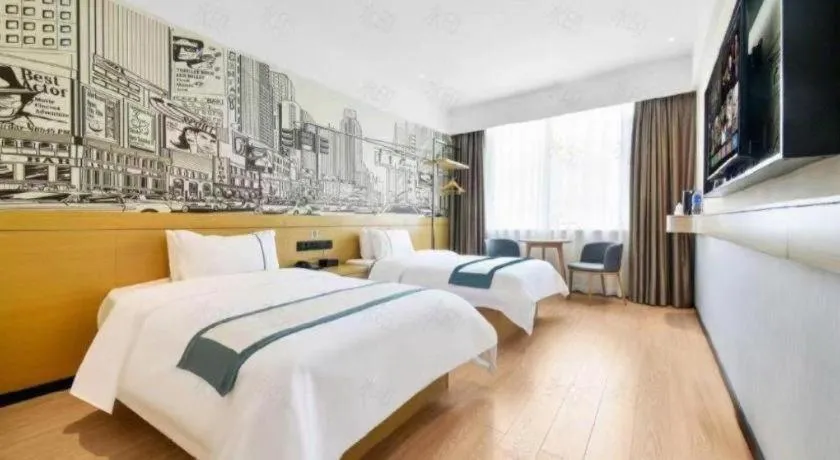 Bed in City Comfort Inn Wuhan Xinzhou Mo'er Cheng