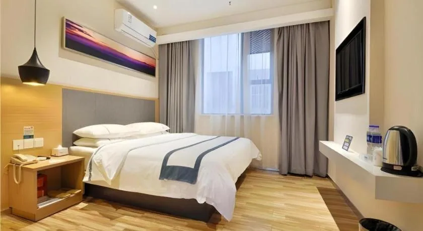 Bed in City Comfort Inn Wuhan Xinzhou Mo'er Cheng