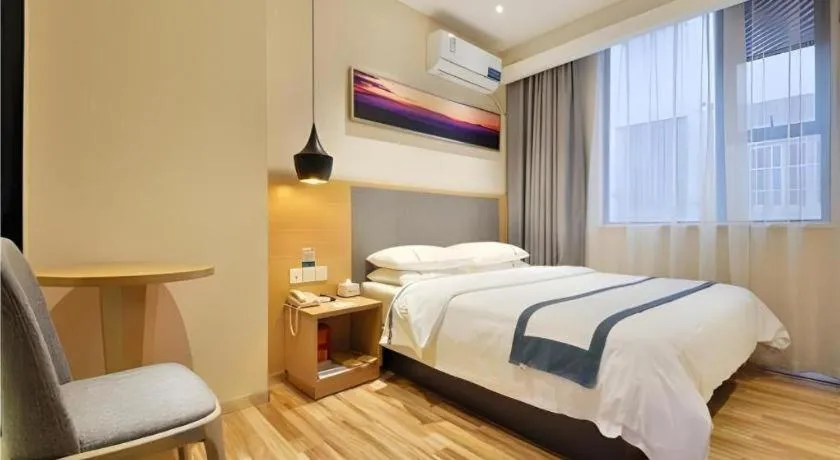 Bed in City Comfort Inn Wuhan Xinzhou Mo'er Cheng