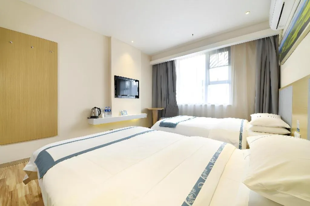 Bed in City Comfort Inn Wuhan Xinzhou Mo'er Cheng