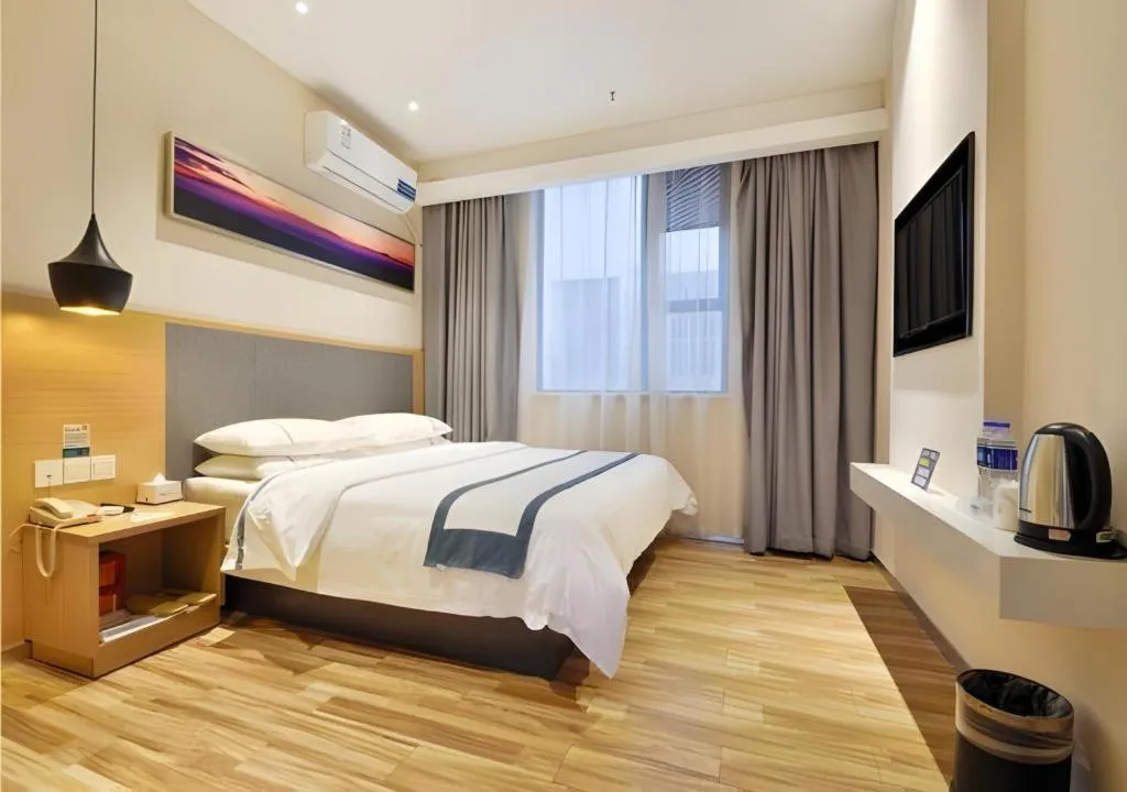 Bed in City Comfort Inn Wuhan Xinzhou Mo'er Cheng