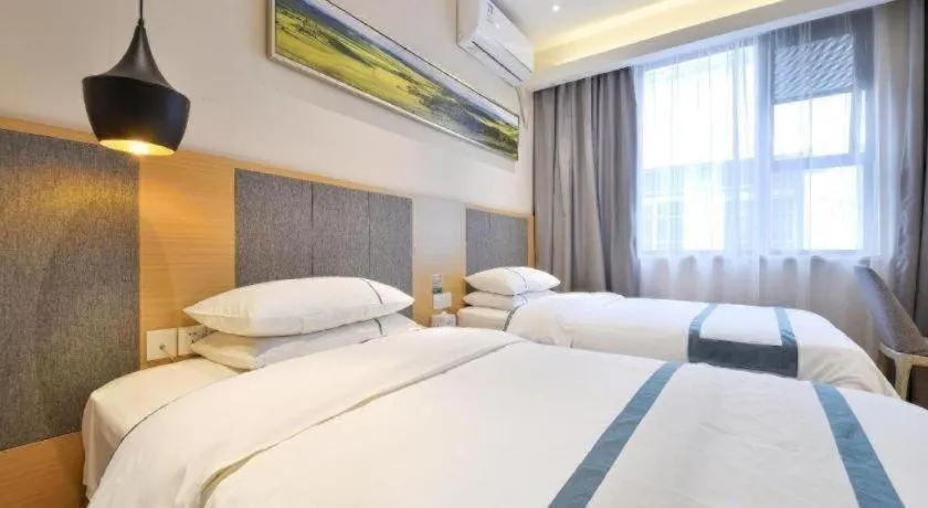 Bed in City Comfort Inn Wuhan Xinzhou Mo'er Cheng