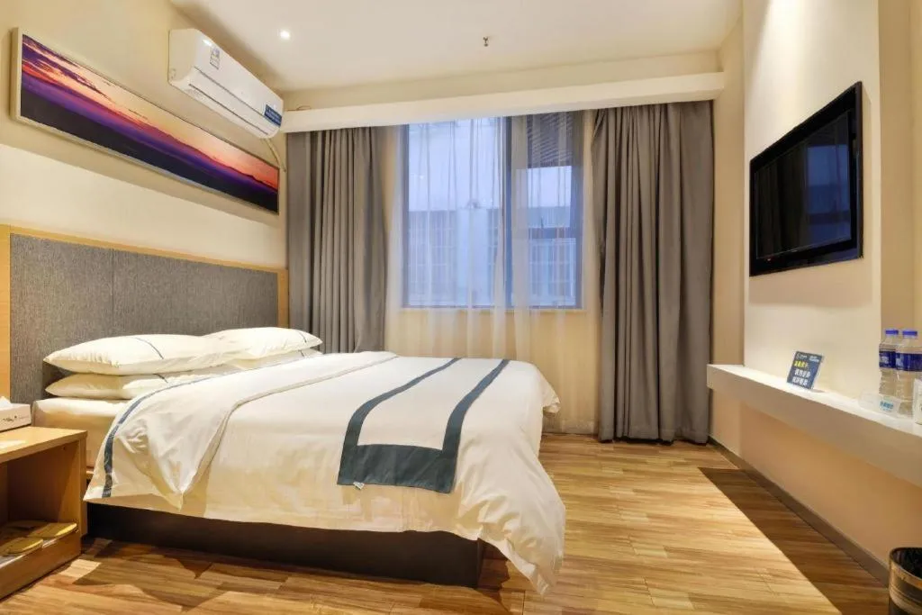 Bed in City Comfort Inn Wuhan Xinzhou Mo'er Cheng