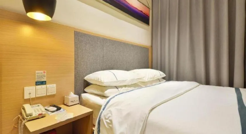 Bed in City Comfort Inn Wuhan Xinzhou Mo'er Cheng