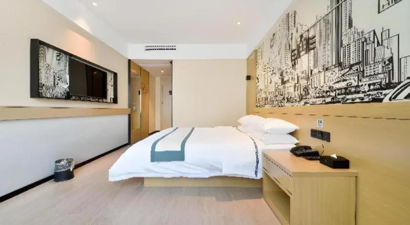 Bed in City Comfort Inn Wuhan Xinzhou Mo'er Cheng