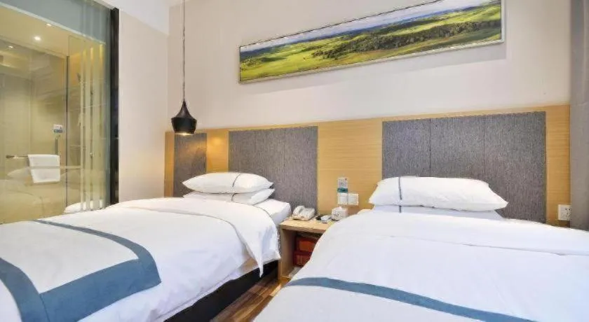 Bed in City Comfort Inn Wuhan Xinzhou Mo'er Cheng