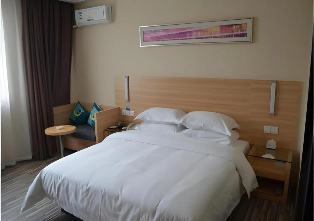 Bed in City Comfort Inn Huizhou Huiyang High-speed Railway Station