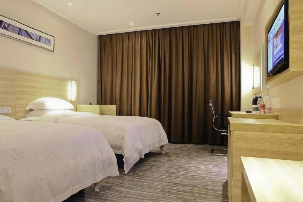 Bed in City Comfort Inn Huizhou Huiyang High-speed Railway Station