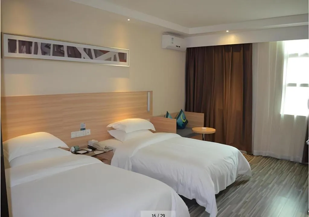 Bed in City Comfort Inn Huizhou Huiyang High-speed Railway Station