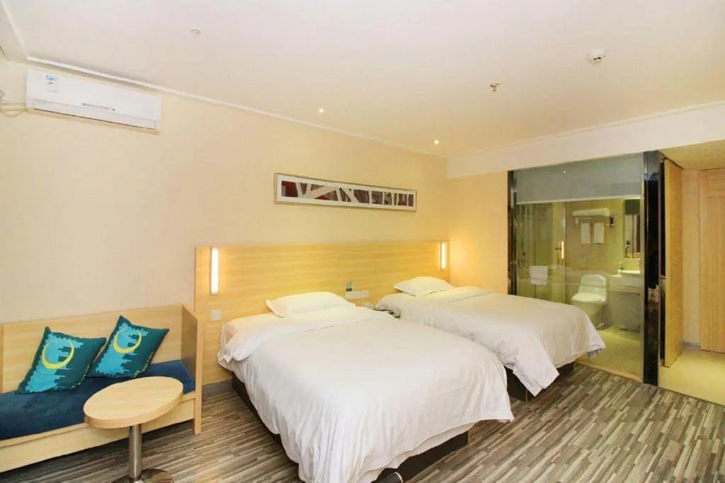 Bed in City Comfort Inn Huizhou Huiyang High-speed Railway Station