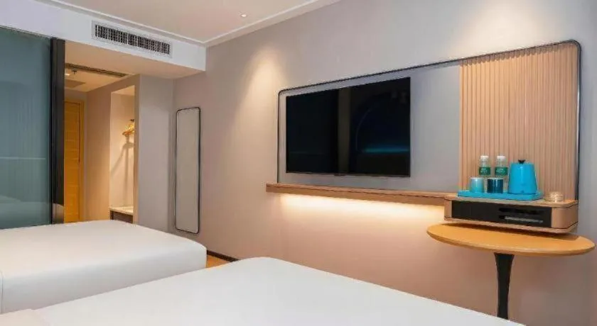 Bed in City Comfort Inn Guigang Pingnan Bus Station Jiangbin Park