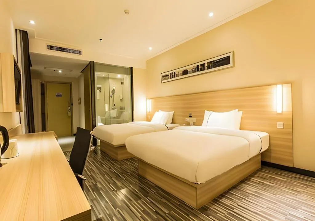 Bed in City Comfort Inn Guigang Pingnan Bus Station Jiangbin Park