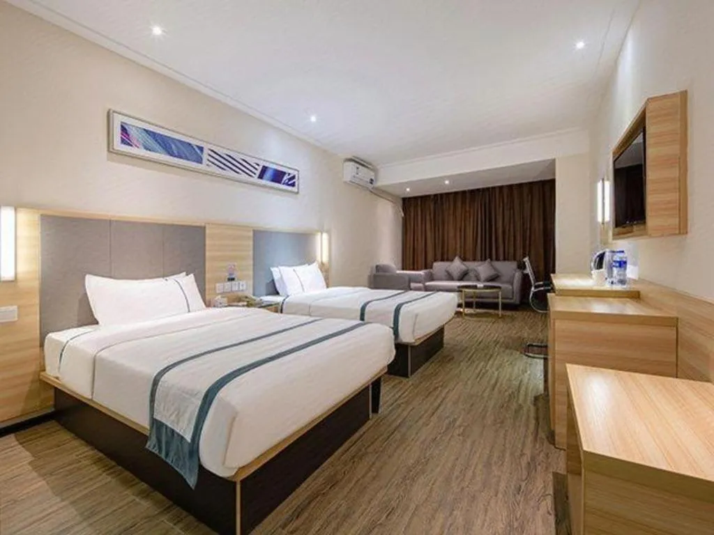 Bed in City Comfort Inn Wuzhou Arcade City Sanzongfu