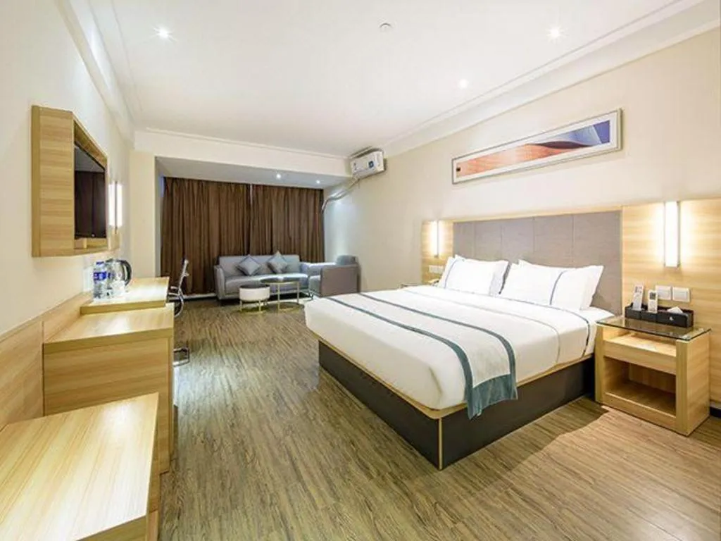 Bed in City Comfort Inn Wuzhou Arcade City Sanzongfu