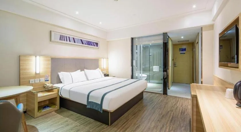 Bed in City Comfort Inn Wuzhou Arcade City Sanzongfu