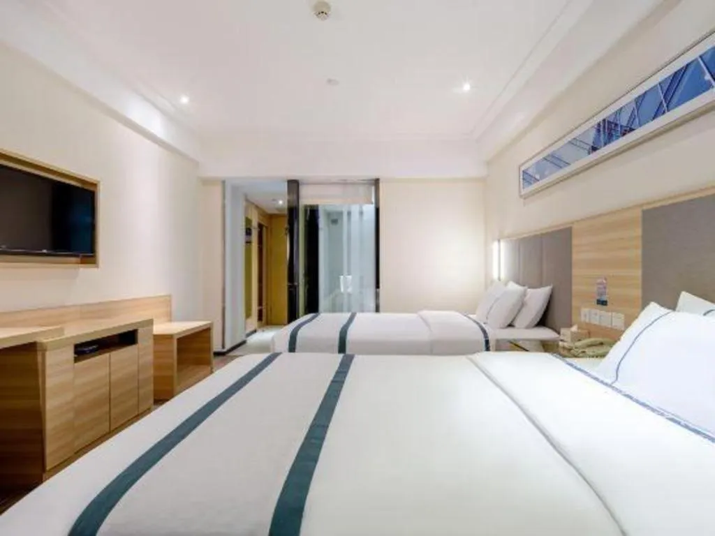 Bed in City Comfort Inn Wuzhou Arcade City Sanzongfu