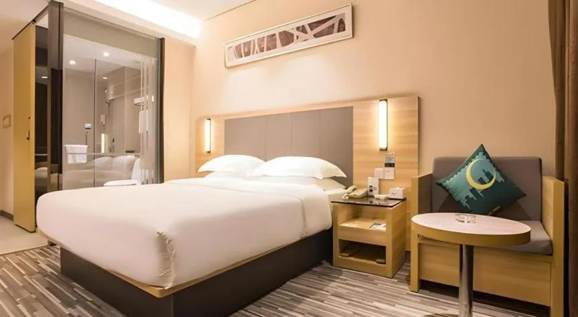 Bed in City Comfort Inn Wuzhou Arcade City Sanzongfu