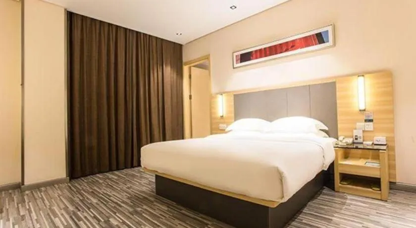 Bed in City Comfort Inn Wuzhou Arcade City Sanzongfu