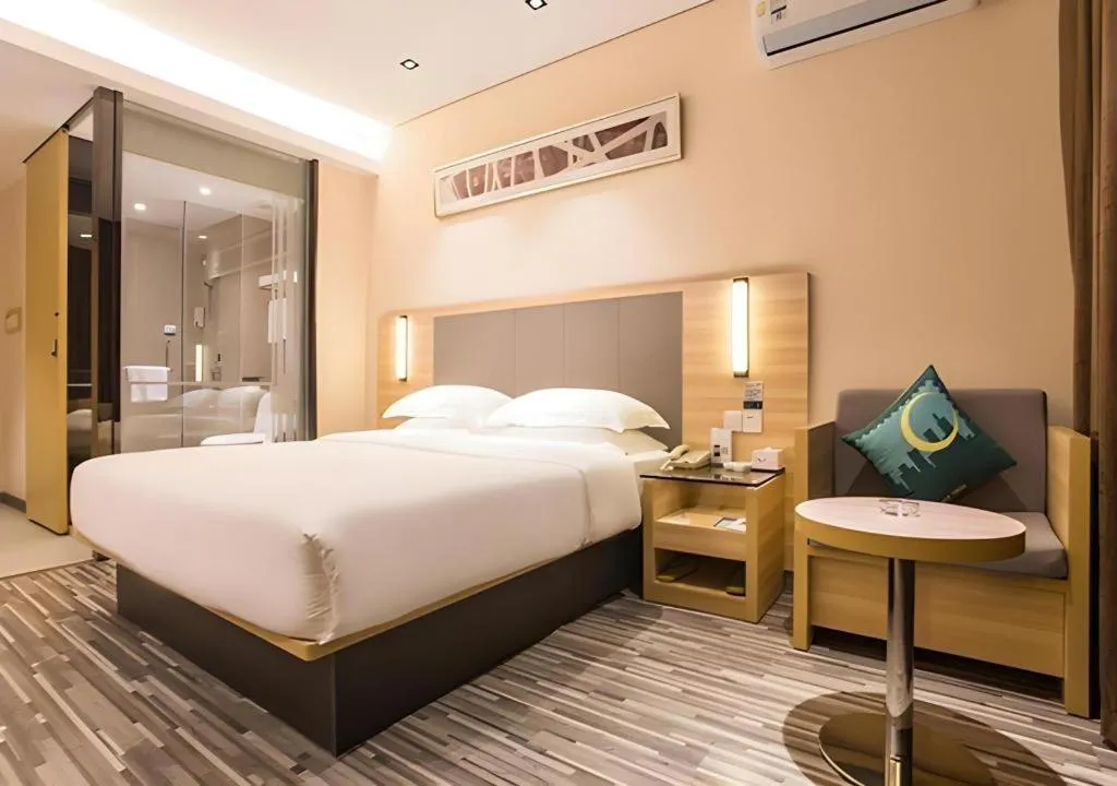 Bed in City Comfort Inn Wuzhou Arcade City Sanzongfu