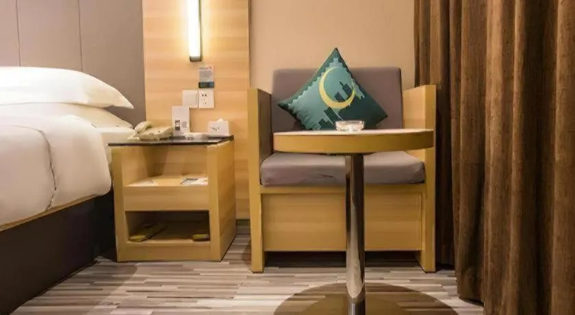 Bed in City Comfort Inn Wuzhou Arcade City Sanzongfu