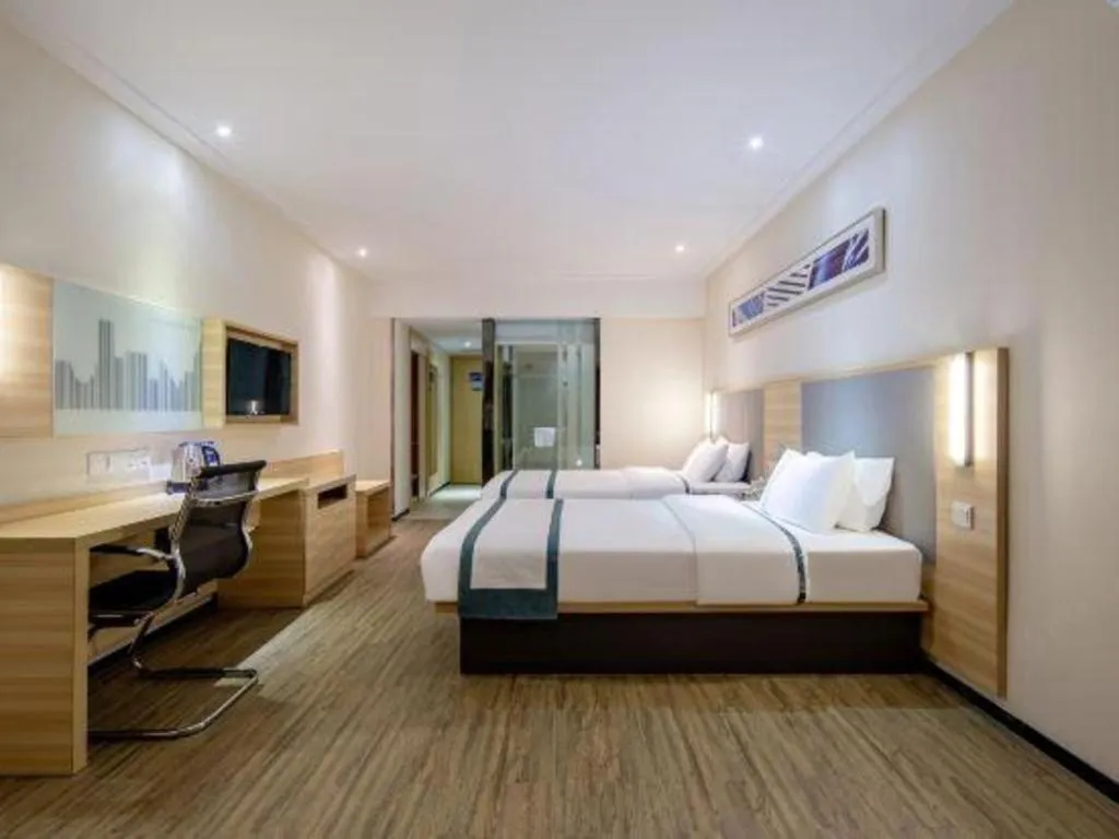 Bed in City Comfort Inn Wuzhou Arcade City Sanzongfu