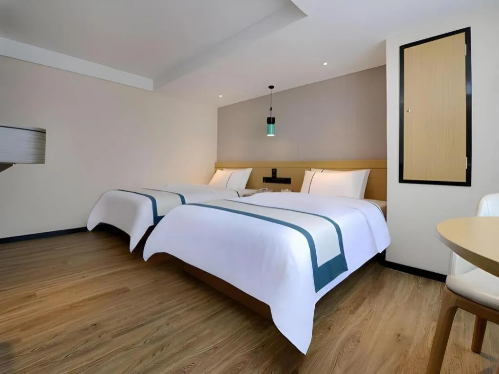 Bed in City Comfort Inn Guiyang North High Speed Railway Station