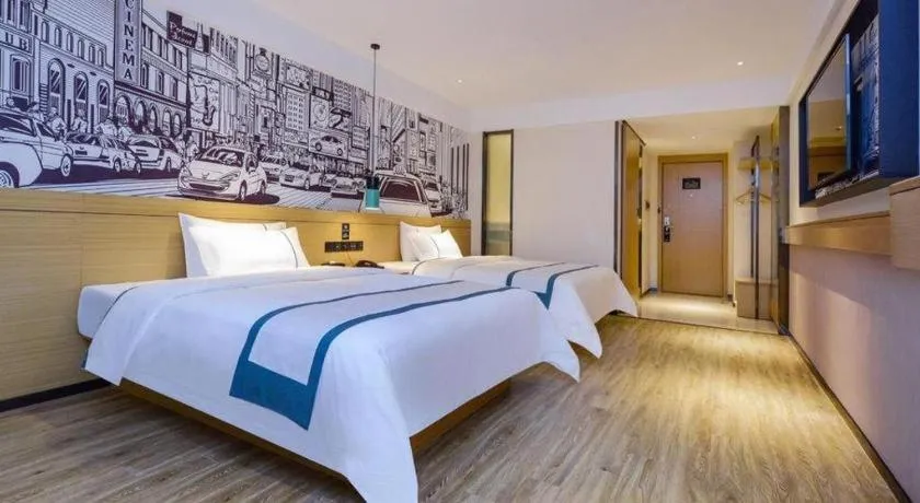 Bed in City Comfort Inn Zunyi Wuchuan